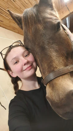 Monica with her horse.
